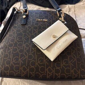 Calvin Klein Black and Brown Shoulder Bag with Monogram Design
